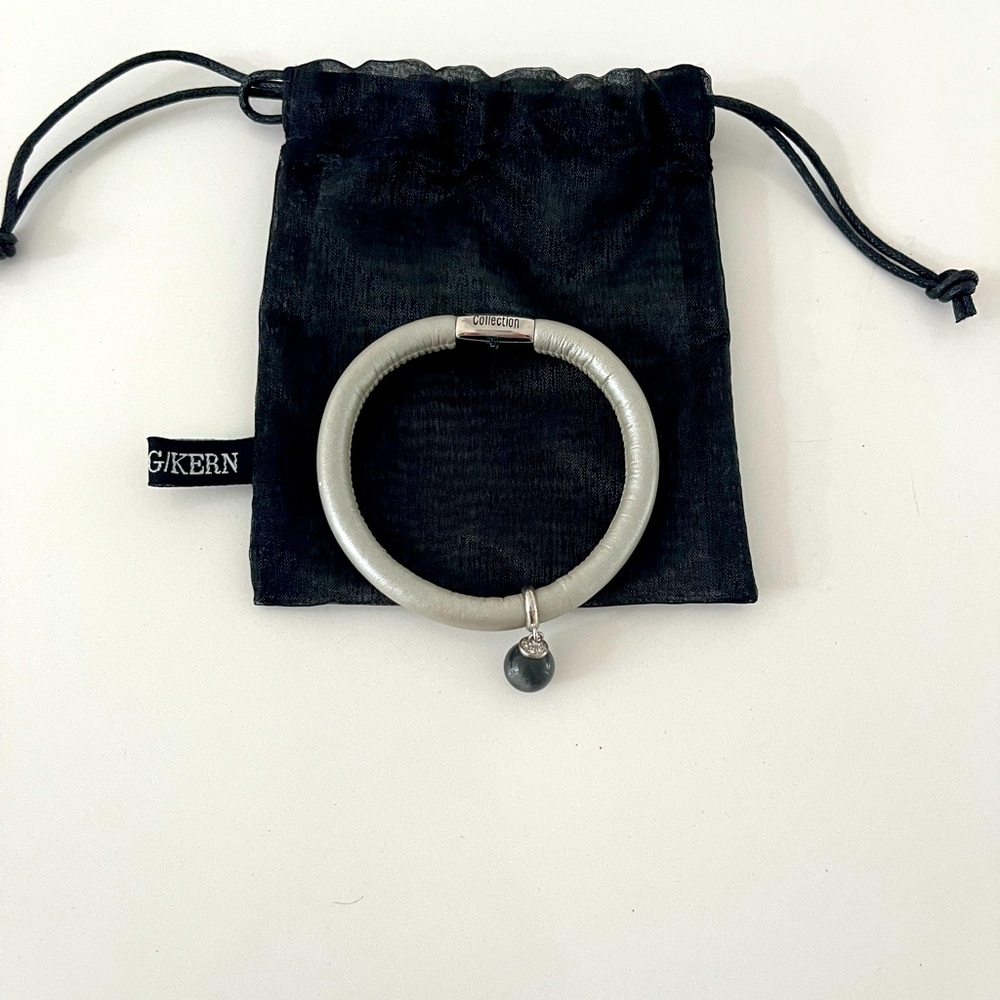 NEW Jennifer Lopez new Leather bracelet with silver dangling charm grey stone.